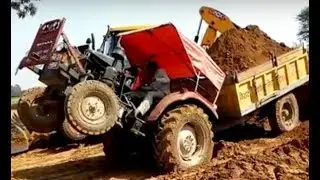 Tempo ox Tractor stuck with soil trolly