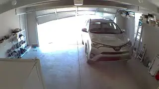 Car Backs into Garage Door Before It's Fully Open || ViralHog