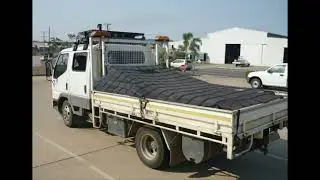 Toyota Land Cruiser Winch Truck rocking a Safeguard Cargo Net Off Road