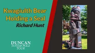 22. Kwagu'ł Bear Holding a Seal - Gwe-la-y-gwe-la-gya-les (Richard Hunt)