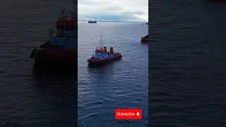 Efficient coal loading &mdash; barge to vessel at anchorage#marine#marineservices#coal#barge#vessel#ship 