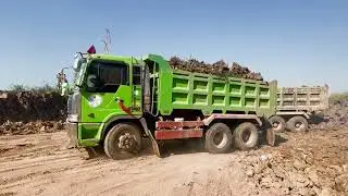 Fast operation Very well -Cat 385C Excavator Loading Cat 773 & 775 Dumpers On A Highway Project