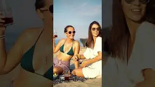 Two Young Bikini Model at the Beach