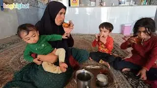 Bringing firewood for the winter by a single nomadic woman for the children