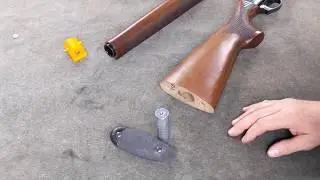 Modification to shotgun, finishing the 1/2 pound weight with threaded insert used for extraction