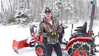 Kubota B2601 compact tractor. How many snow removal attachments do you really need? outdoors. #241