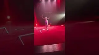 At the circus! Look at that dog jumping !