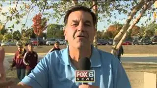 Tom Pipines checks out the football rivalry in West Bend