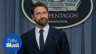 Gerard Butler gives a speech in the Pentagon's briefing room