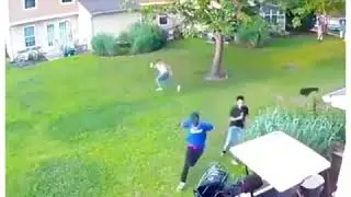 guy runs from a dog and jumps on a golf cart