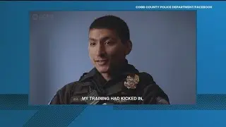 Cobb County Police Officer rescues driver from burning car