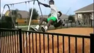 Kid Tries To Jump Off Swing, Fails Hard