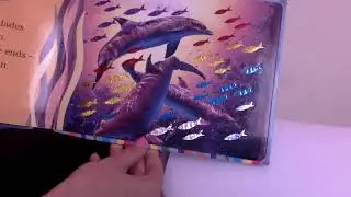 Teacher Zena reading Moon Dance letter of the day U underwater activity