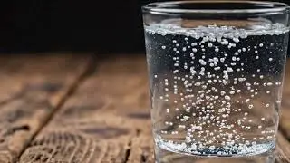 Laser Hits Metal Sphere into Fizzy Water - Slow Motion Physics!
