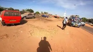 walking through Brufut village Gambia