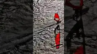 Extreme windsurfing on the river Rhein near D&uuml;sseldorf with funnel (shorts)