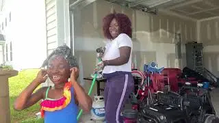 Washing my daughter hair with a ￼hose ￼