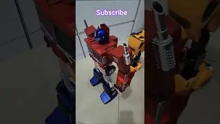Optimus Prime Back to back with Bumblebee #robosen #transformers #robosenbumblebee #bumblebee