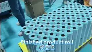 Fully automatic four-axis glue-free slitting and rewinding machine