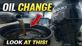 Apprentice Mechanic Does an Outboard Oil Change
