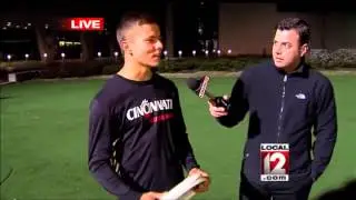 Adam Clements tries his hand at Frisbee with UC team