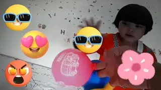 meletuskan balon sambil bernyanyi