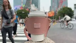 Adjustable strap coffee cup holder + Tumbler Holder. Fits large sizes and is made from Vegan Leather