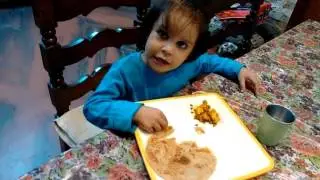 Baby eating food parantha