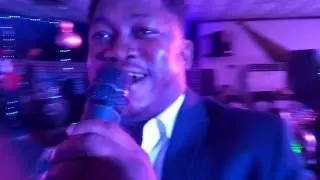 A white American man dancing to Bukwild and his Fisherman  band
