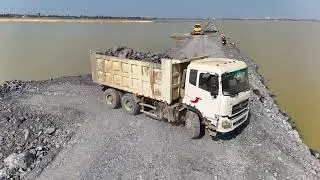 EP05,Fantastic road project Use a truck,wheel loaderand a Dozer Shantui to dump rocks into a sizabl