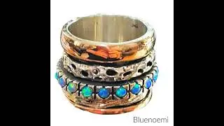 Bluenoemi Jewelry & Gifts -  Blue opals on a silver and gold spinner ring.