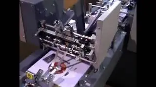 KAS Paper Systems  - Envelope inserter with overtrack feeders for DVD and plastic cards