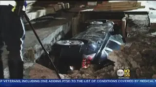 Car Crashes Into Construction Worker