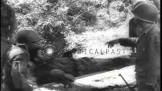 American Forces led by General MacArthur land at the Lingayen Gulf and advance to...HD Stock Footage