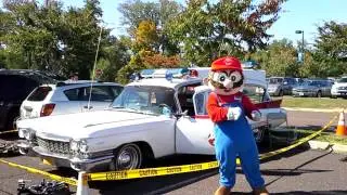 Mario Dancing in Front of Ghosterbuster Mobile Ecto-1 at RetroCon