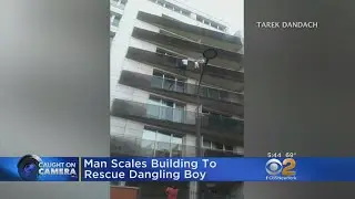 WATCH: Real-Life Spiderman Scales Building To Save Dangling Child