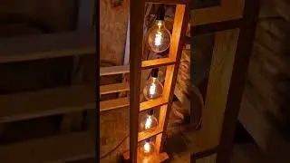 Beautiful handmade floor lamp with 5 spiral filament bulbs. Made from solid oak wood.