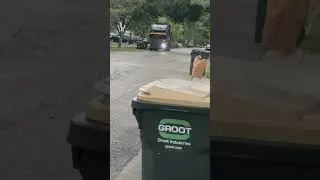 Groot Mack Mcneilus front loader with currotto can on yard waste.
