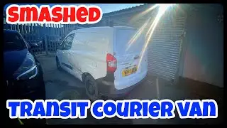 Smashed transit courier van from Copart