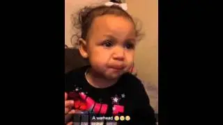 1 year old baby eats warhead candy for the first time