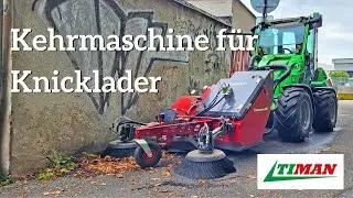 Avant Knicklader im Einsatz mit einer Kehrmaschine von Timan | Tornado 400 Kehr-/Saugger&auml;t