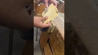 Sanding Pine block by hand - mechanical toy project