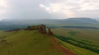 Aerial View of the Green Fields of Mountain Range Sunduki before the Storm | Stock Footage -