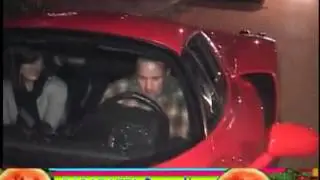 SANDRA BULLOCK and JESSE JAMES leave dinner in red Ferrari