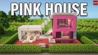 Beautiful pink house in minecraft with a pool