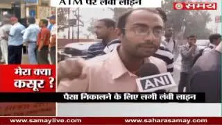 People Reactions on long queues out of the ATM to cash