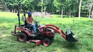 Cutting the field with a kioti cs2410