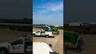 Many tractors, one goal &mdash; feed for the feedlot.