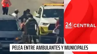 Batalla campal entre ambulantes y municipales en playa de Cartagena | 24 Horas TVN Chile