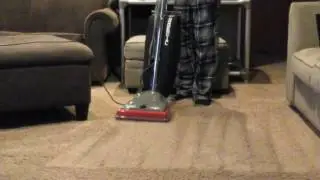 Vacuuming  with  the  sanitaire  sc679j